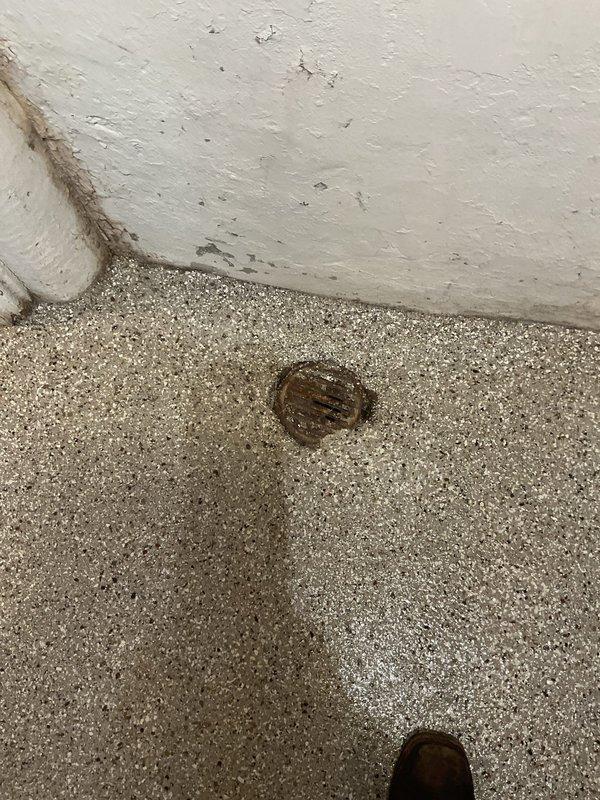 Responded to complaint of slow-draining floor drains in basement that worsen after rainfall, along with slow drainage in upstairs bathtub. Inspected multiple floor drains in basement area and assessed drainage system. Performed rodding service on affected drain lines to clear blockages causing backup issues. Cleared obstruction from main drainage system, restoring proper flow to both basement floor drains and upstairs plumbing fixtures.