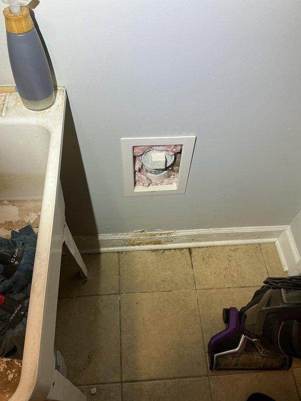 Conducted inspection of sump pump system accessed through utility room floor opening. Removed access panel to evaluate brick-lined sump pit condition and pump operation. Documentation revealed significant deterioration of brick and mortar within the vertical shaft, with visible structural degradation, crumbling mortar joints, and moisture damage throughout. Observed debris accumulation at pit bottom and evidence of previous repair attempts. Photographed existing conditions for service records. Follow-up appointment scheduled to complete necessary repairs and system restoration.