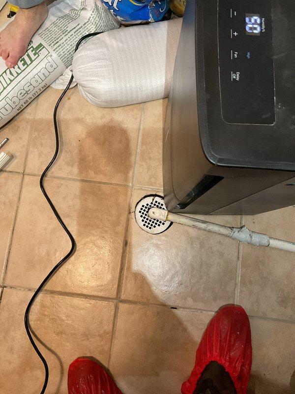 Responded to basement floor drain backup. Upon arrival, assessed the drainage system and identified blockage causing water to back up through the basement floor drain. Cleared the obstruction and restored proper drainage flow. Verified system was functioning correctly before completing service.