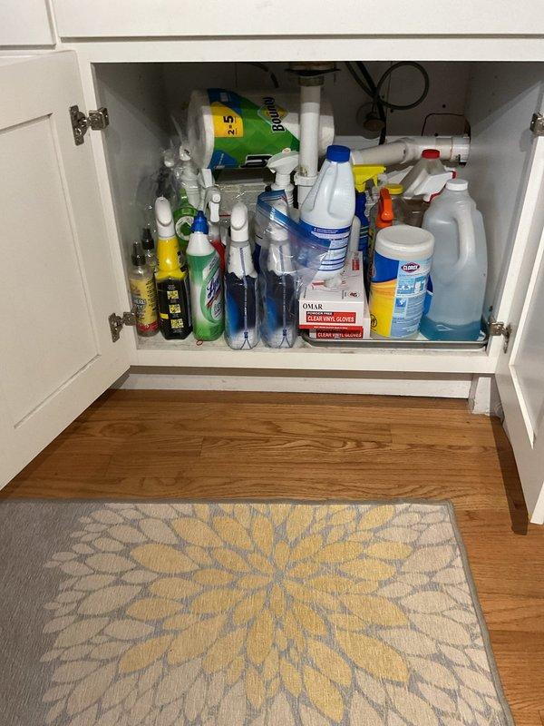 Responded to backup in laundry room sink on lower level unit. Upon arrival, accessed under-sink plumbing to inspect drain lines and P-trap for obstruction. Cleared clog using professional drain equipment, restoring proper drainage and flow to the sink. Verified that backup was isolated to this unit's plumbing system and not originating from upper units as initially suspected.
