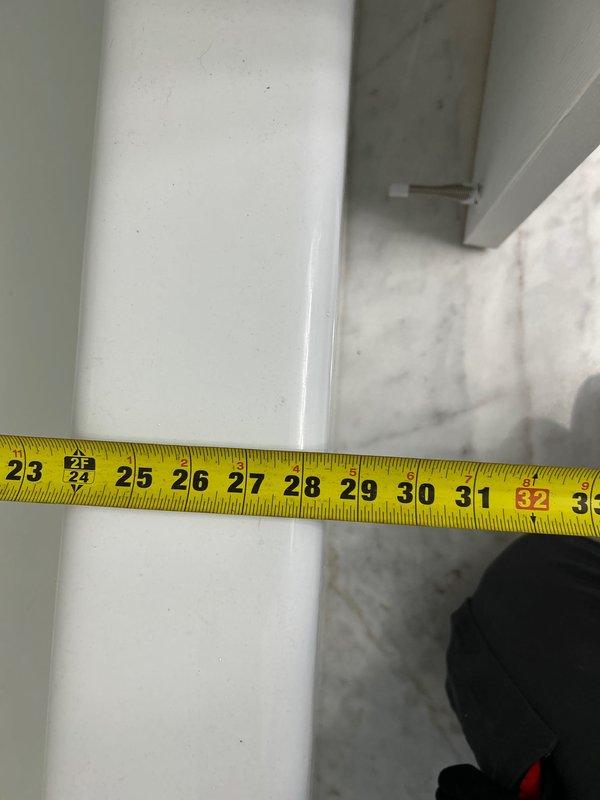 Responded to water leak from sink drain in unoccupied apartment. Upon arrival, contacted property owner and gained access to assess the issue. Inspected plumbing connections beneath kitchen sink and identified source of leak at drain assembly. Documented measurements and existing conditions with photographs for service records.