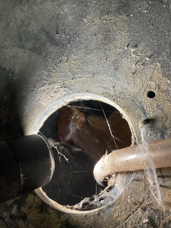 Completed installation of new sump pump system with battery backup in basement utility area. Installed primary sump pump in black basin with vertical PVC discharge piping, including check valve and control handle assembly, connected electrical components with wall-mounted control unit and junction box, and integrated battery backup system to ensure continuous operation during power outages.