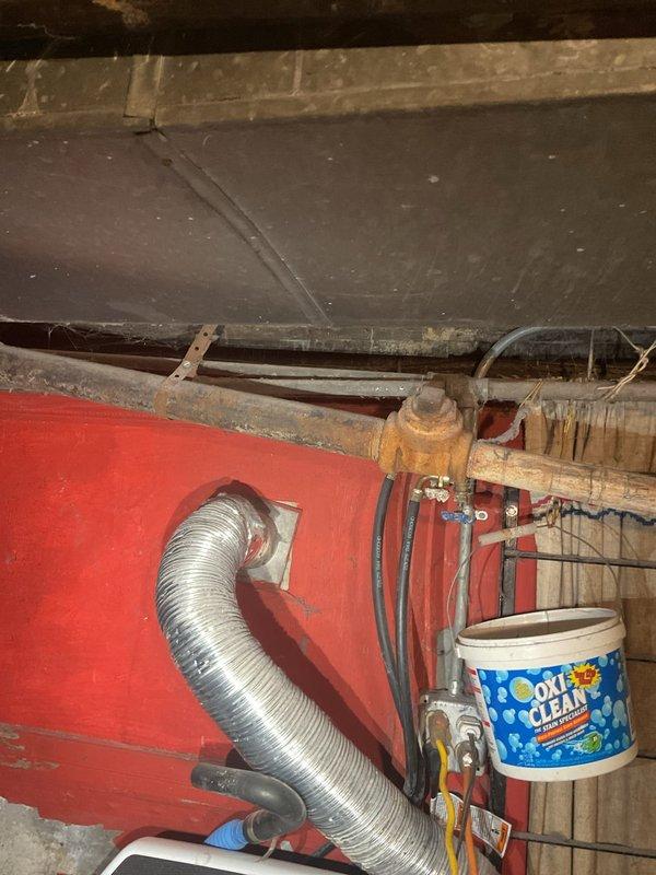 Completed installation of new kitchen drain line system from first floor to main sewer line. Installed new P-trap and PVC piping from kitchen sink connecting to newly installed kitchen stack. Ran kitchen stack through basement to existing sewer connection and integrated new floor drain at pre-excavated location from previous site preparation work.