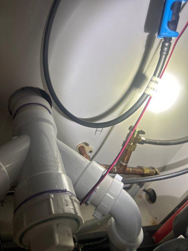 Responded to customer request for reverse osmosis system installation consultation at single-family residence. Performed site assessment of existing plumbing infrastructure, including water heater connections and supply line configuration with PVC piping. Evaluated installation requirements and discussed system placement options with homeowner to determine optimal location for under-sink reverse osmosis unit integration with current water supply system.