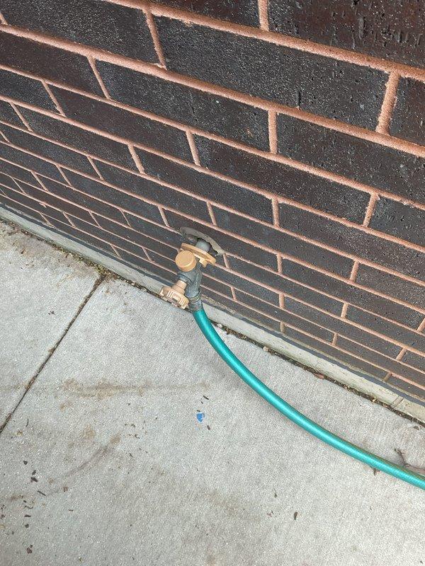 Responded to service call for damaged outdoor hose bib that was forcibly removed from exterior brick wall. Upon arrival, assessed the compromised mounting and water supply line connection. Removed damaged fixture, inspected supply piping for integrity, and installed new brass hose bib with proper wall mount anchoring into brick substrate. Tested system for leaks and verified proper water flow and shutoff functionality.