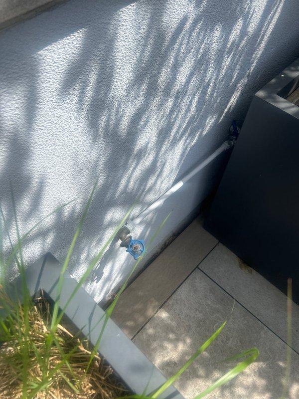 Responded to report of two leaking outdoor faucets requiring repair. Addressed broken pipe leading to garage roof faucet and repaired leaking hose bib mounted on exterior wall. Replaced damaged piping section and secured connections to eliminate water loss. Tested both outdoor faucet locations for proper operation and verified all leaks were resolved with no additional water seepage detected.