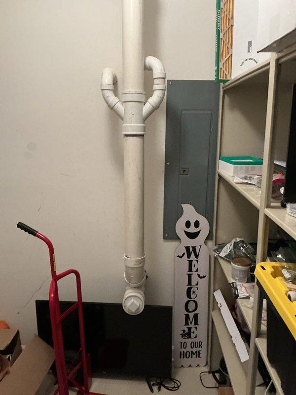 Responded to recurring basement ejector pump failure on fourth service visit for ongoing warranty issue in 24-year-old home. Upon arrival, discovered significant water damage to carpeted floor surrounding ejector pump installation, with standing water and saturation visible around PVC discharge piping. Inspected pump system, discharge plumbing, and electrical connections to diagnose persistent malfunction. Documented water intrusion damage and compromised flooring conditions with photographs for warranty claim processing. Evaluated pump performance, check valve operation, and float switch functionality to identify root cause of repeated failures.
