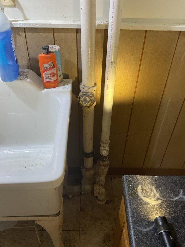 Responded to a slow-draining laundry sink in the basement utility area. Upon inspection, confirmed drainage issues affecting the utility sink with water backing up and draining at a significantly reduced rate. Assessed the plumbing system and identified concerns with the main sewer line, noting visible cracking that would require repair to prevent future drainage complications and potential backups throughout the residence.