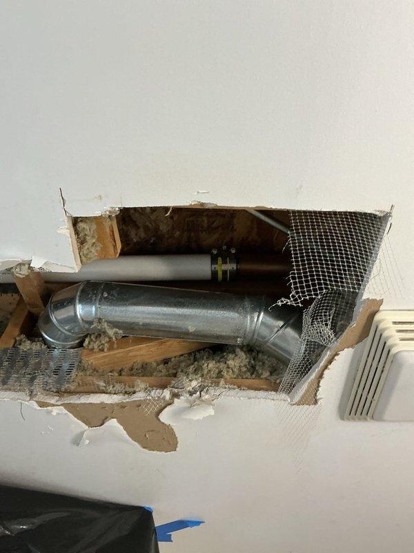 Returned to complete repair of broken pipe in bathroom ceiling following shower pan installation by another contractor. Accessed work area through existing ceiling opening, repaired damaged pipe section, and coordinated with ongoing bathroom renovation to finalize plumbing portion of project.