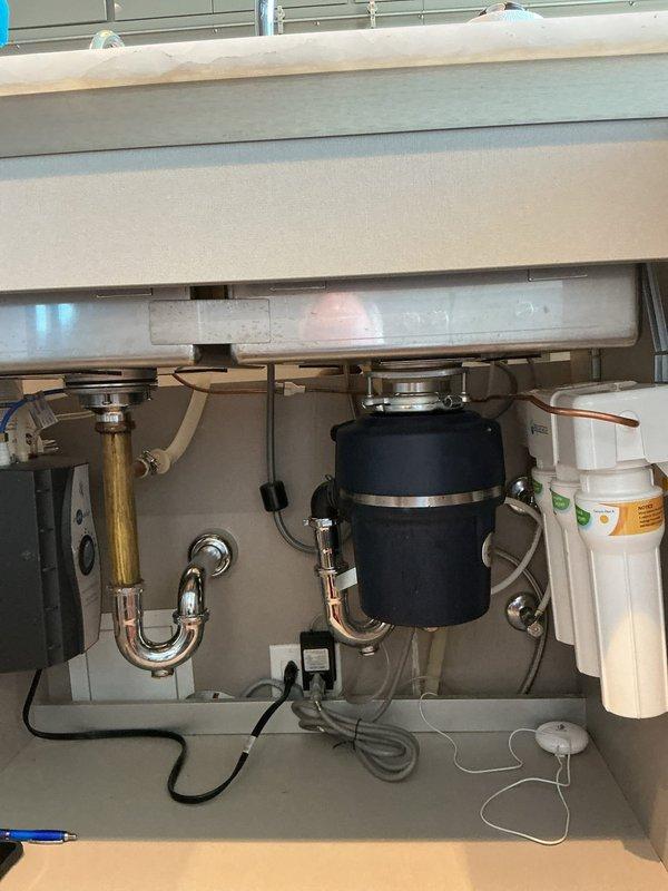 Installed under-sink water filtration system in kitchen, completing full plumbing connections to existing supply lines and ensuring proper integration with garbage disposal and P-trap assembly. Inspected primary bathroom shower experiencing active leak, documenting extensive water damage, tile deterioration, and mold growth throughout accessible shower enclosure requiring comprehensive remediation and fixture replacement.