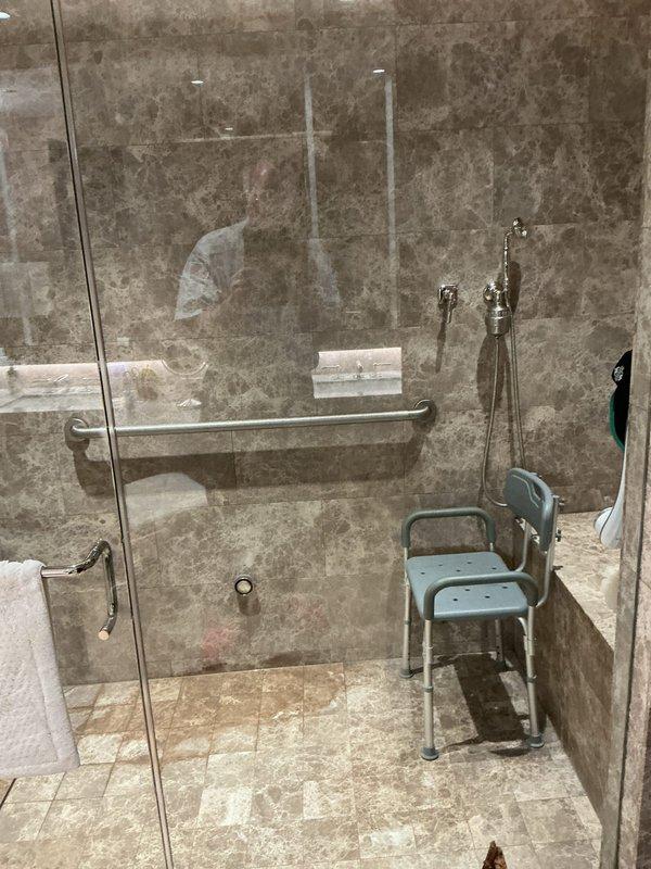 Installed under-sink water filtration system in kitchen, completing full plumbing connections to existing supply lines and ensuring proper integration with garbage disposal and P-trap assembly. Inspected primary bathroom shower experiencing active leak, documenting extensive water damage, tile deterioration, and mold growth throughout accessible shower enclosure requiring comprehensive remediation and fixture replacement.