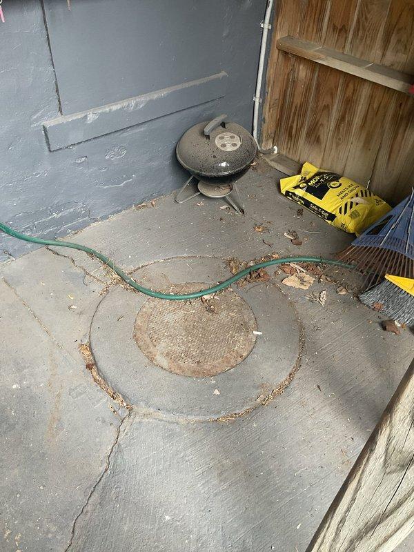 Completed residential drain and sewer inspection for estimate purposes. Assessed exterior sewer access point with visible concrete deterioration and cracking around cleanout cover, noting significant wear patterns indicating potential underground line issues. Evaluated interior plumbing infrastructure revealing corroded galvanized pipes with rust formation at joints and fittings, requiring replacement to prevent future failures. Provided comprehensive estimate for sewer line rodding service and pipe replacement work necessary to restore proper drainage system functionality.