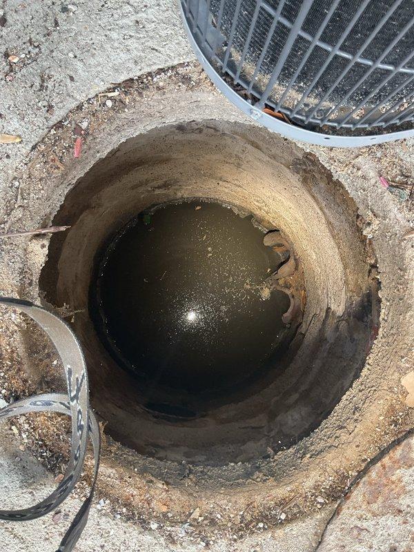 Responded to afternoon appointment for sewer rod estimate at residential property. Inspected outdoor drainage access point showing standing water with visible debris and buildup, indicating potential blockage in the main sewer line. Documented conditions of the drainage system access and surrounding utility area, photographed evidence of drainage issues, and provided estimate for sewer rodding service to clear obstruction and restore proper flow.