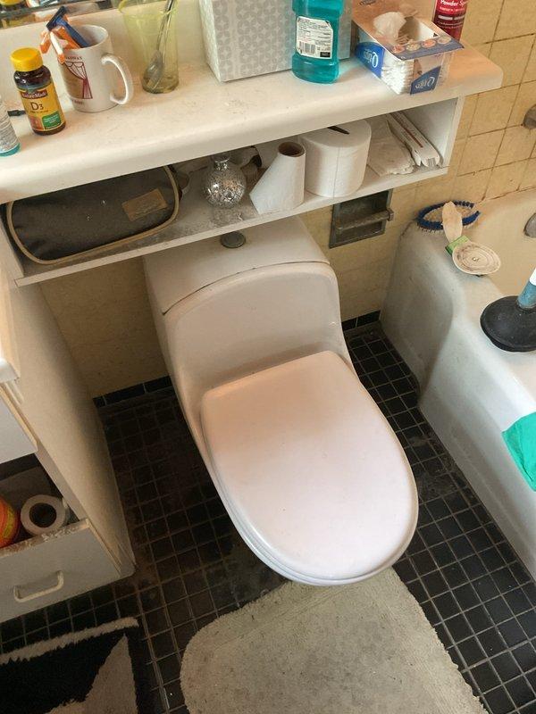 Responded to service call for three running toilets with suspected faulty flapper valves. Inspected toilet tank revealing deteriorated rubber flapper with compromised seal, evident mineral deposits and rust staining throughout tank interior indicating hard water conditions and continuous water flow. Replaced defective flapper valve and chain assembly, serviced remaining two toilets with similar flapper replacements, and verified proper shutoff and fill cycle operation on all three fixtures.