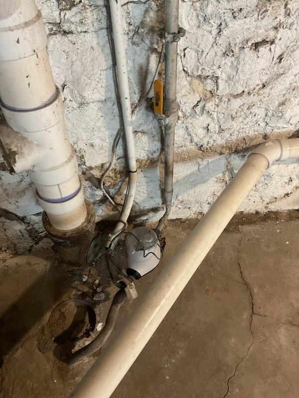 Responded to priority service call for garbage disposal replacement and shower valve repair. Upon arrival, assessed kitchen garbage disposal unit and determined complete replacement was necessary due to mechanical failure. Evaluated bathroom shower fixture where control knob had broken off, resulting in complete loss of water flow to the shower. Inspected plumbing infrastructure and electrical panel to ensure proper circuit identification and shut-off capabilities for safe work execution. Documented existing conditions of basement plumbing system, including aged pipe connections and utility infrastructure. Provided assessment and recommendations for disposal replacement and shower valve repair to restore full functionality to both fixtures.