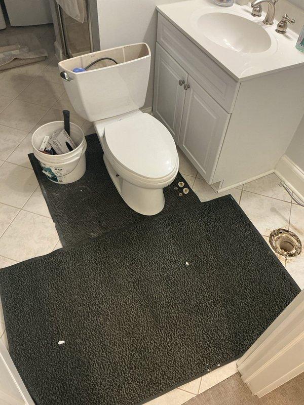 Conducted comprehensive drain and sewer estimate assessment for residential bathroom. Performed thorough inspection of plumbing fixtures including toilet, vanity sink with chrome faucet assembly, and visible drainage points. Documented existing conditions through photographic survey to identify potential drainage issues and evaluate sewer line access points for future service recommendations.