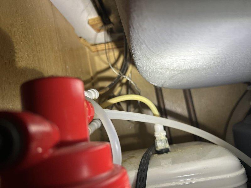 Responded to service call for non-functioning garbage disposal unit beneath kitchen sink. Upon inspection, found existing disposal unit inoperable and requiring replacement. Successfully removed failed disposal unit and installed new garbage disposal, ensuring proper electrical connections and secure mounting to sink drain assembly. Verified all plumbing connections including P-trap alignment and tested unit for proper operation and drainage. Also assessed kitchen sink faucet and under-sink water filtration system per customer request for future replacement consideration.