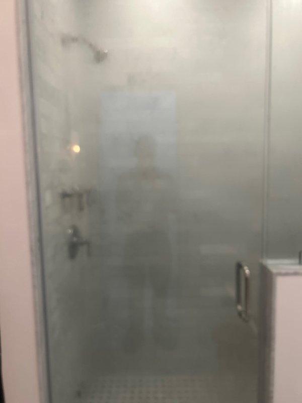 Responded to service call for steam shower reattachment and operational testing in commercial bathroom. Successfully secured steam shower unit to wall mounting points, verified all plumbing connections to copper supply lines and chrome angle stop valve, and conducted full system pressure test to confirm proper functionality. Steam generation system tested and confirmed operational with no leaks detected at connection points or supply lines.