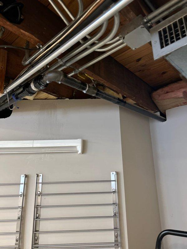 Responded to gas leak in single family home utility room. Isolated and removed all compromised gas piping serving furnace and water heater. Installed new gas distribution system using 1-1/4", 1", 3/4", and 1/2" black iron pipe with appropriate gas mega press couplings and threaded fittings, properly sized to accommodate BTU requirements of both appliances. Pressure tested complete system at 5 PSI for 15 minutes per code requirements with successful hold, confirming leak-free installation and safe operation.
