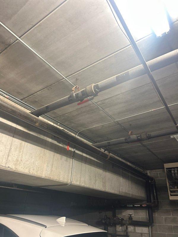 Conducted assessment of failed water booster system in an eighteen-unit, five-story commercial building. Evaluated a non-operational 3 HP ground floor booster pump (approximately 15-20 years old), inspected the adjacent expansion tank for potential replacement needs, and identified necessary pipe repairs connected to the expansion tank. Documented existing mechanical infrastructure and provided comprehensive estimate for system restoration.