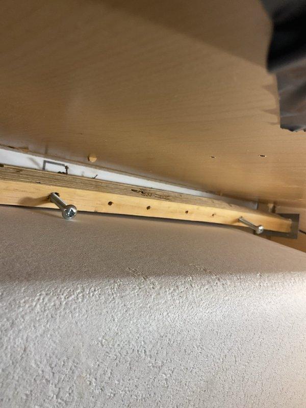 Responded to priority service call for kitchen and bathroom sinks not draining in 30-year-old home, issue ongoing for one month. Accessed plumbing system through attic crawl space to inspect drain lines and venting. Cleared blockages from affected drain lines restoring proper drainage to both fixtures. Removed debris from bathroom sink area including deceased gecko found on vanity countertop. Verified all drains flowing freely and system operating normally upon completion.
