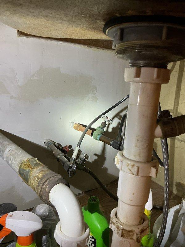 Returned for warranty callback to address recurring faucet leak at bathroom sink with three-hole mounting configuration. Inspected faucet assembly, mounting connections, and supply lines beneath sink. Identified source of leak and performed necessary adjustments to eliminate water seepage. Verified all connections tight and secure, tested water flow through hot and cold supply lines, and confirmed no active leaks present at completion of service.