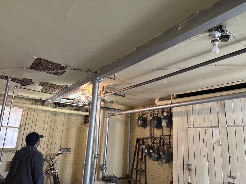 Conducted comprehensive site assessment of existing plumbing infrastructure in deteriorated utility space with exposed piping systems. Documented current conditions of vertical and horizontal pipe runs, including PVC, black iron, and galvanized steel piping configurations along walls and ceiling. Evaluated valve locations, pipe connections, and overall system layout to prepare detailed estimate for piping replacement or repair work needed in the aging mechanical room.