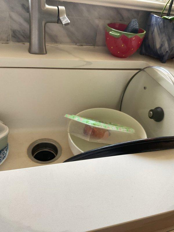 Installed chrome faucet fixtures on bathroom vanity with undermount sink and white cultured marble countertop, and installed modern chrome kitchen faucet on light-colored countertop with gray tile backsplash. Both installations completed with proper mounting and connections verified for functionality.