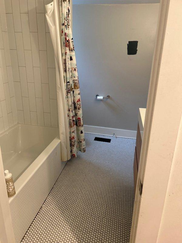 Responded to water leak originating from second-floor bathroom and penetrating through ceiling into first-floor bathroom below. Replaced two Gerber Viper toilets that were identified as the source of the active leak. Leak had progressively worsened over a two-week period prior to service call. Work completed in historic home with updated plumbing systems installed during previous renovation. Verified proper installation, tested for leaks, and confirmed no further water intrusion between floors.