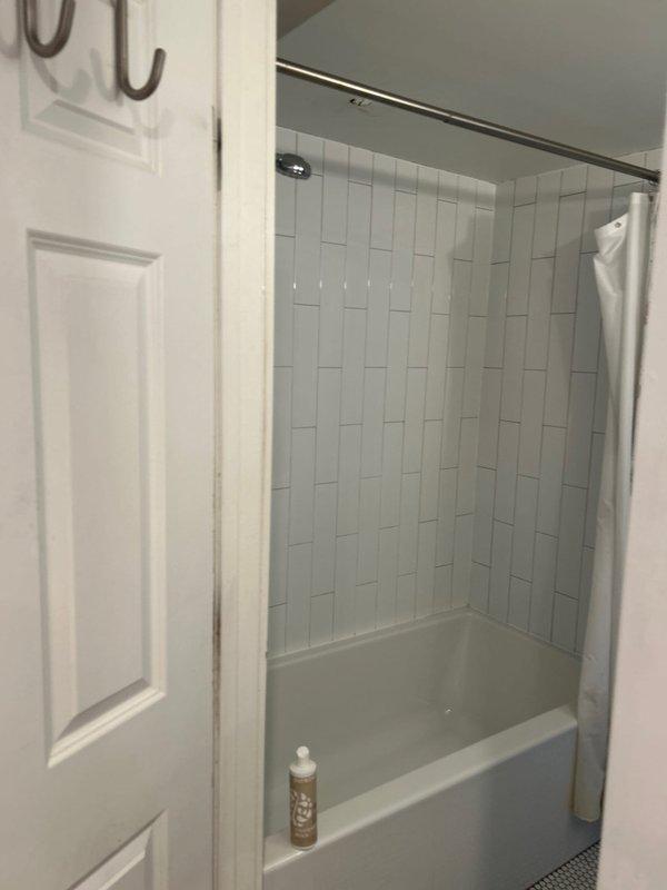 Responded to water leak originating from second-floor bathroom and penetrating through ceiling into first-floor bathroom below. Replaced two Gerber Viper toilets that were identified as the source of the active leak. Leak had progressively worsened over a two-week period prior to service call. Work completed in historic home with updated plumbing systems installed during previous renovation. Verified proper installation, tested for leaks, and confirmed no further water intrusion between floors.