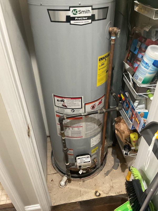 Responded to no hot water call where pilot light would not remain lit on A.O. Smith ProLine water heater installed in 2017. Performed diagnostic assessment of gas water heater and associated components including thermocouple, gas control valve, and pilot assembly. Provided comprehensive estimate for water heater replacement due to failed components and age of unit approaching end of serviceable life.