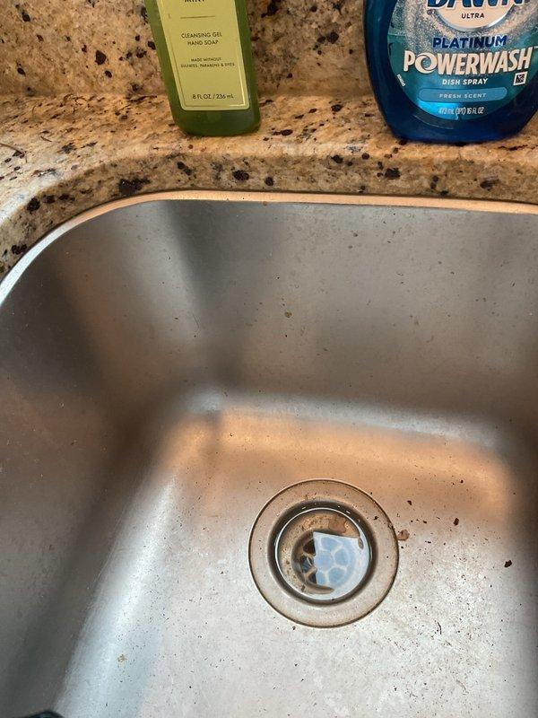 Responded to a clogged kitchen sink on the second floor of a townhouse. Performed rodding service on an extended drain line with a known problematic bend near ground level. Successfully cleared the blockage and restored proper drainage to the affected basin.
