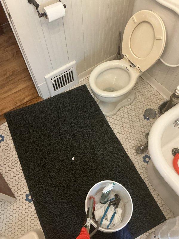 Responded to clogged drain service call at residential bathroom. Upon arrival, assessed plumbing system and identified blockage affecting toilet and sink drainage. Utilized hand tools and plumbing equipment to clear obstruction from drain line. Tested water flow and verified proper drainage function of all fixtures before completing service.