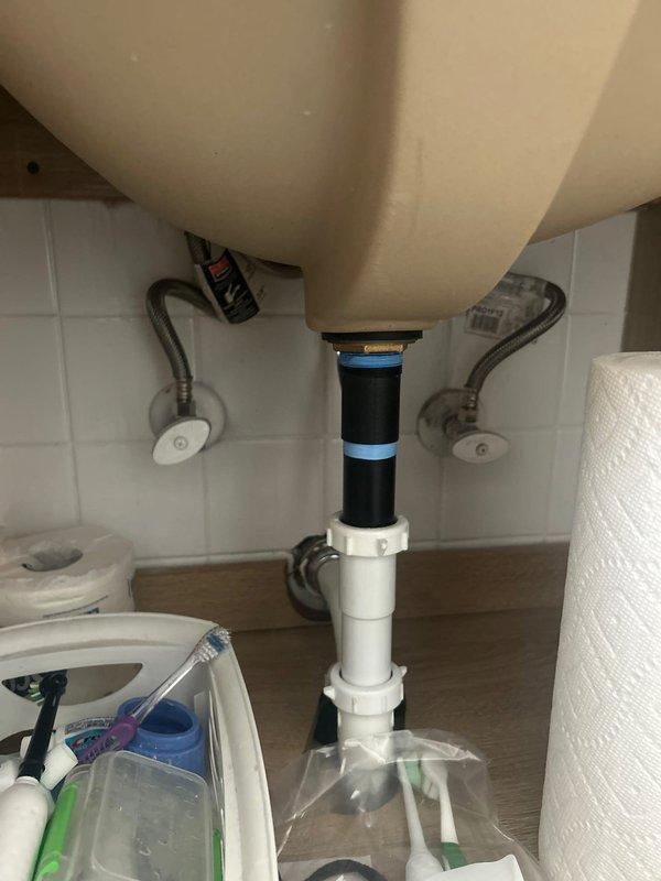 Completed on-site assessment of residential bathroom plumbing system for piping estimate. Inspected bathtub/shower area with existing chrome fixtures and standard alcove configuration, as well as under-sink plumbing including PVC drain assembly, braided supply lines, and shut-off valves. Documented current conditions and photographed all relevant plumbing components to provide accurate piping estimate for requested work.