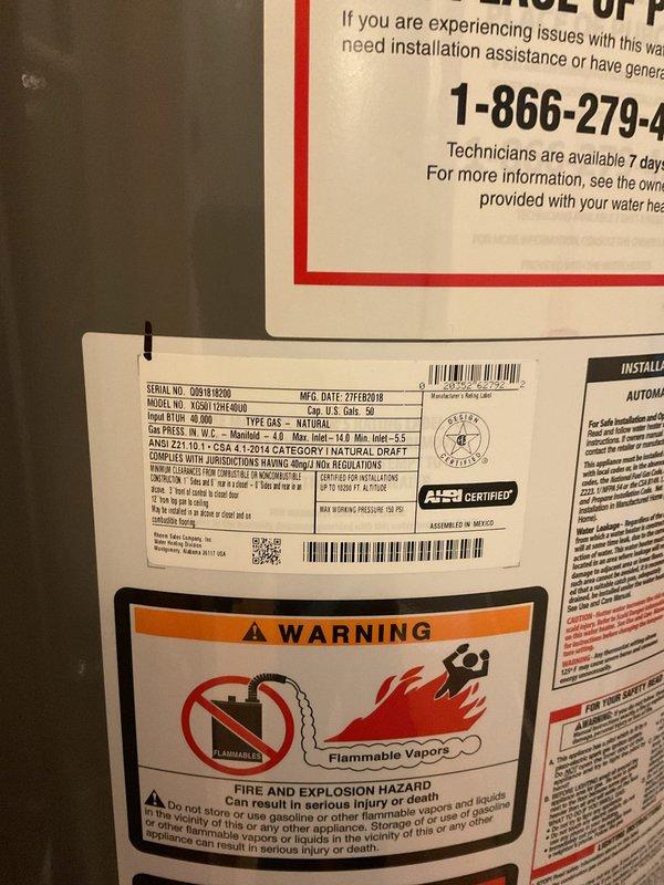 Performed routine maintenance flush on a 50-gallon natural gas water heater (Model XR50T10RF48U0) manufactured in February 2018. Drained and flushed the tank to remove sediment buildup, inspected the gas control valve and burner assembly, and verified proper operation of all safety components. Unit is functioning within normal parameters with no issues identified during service.