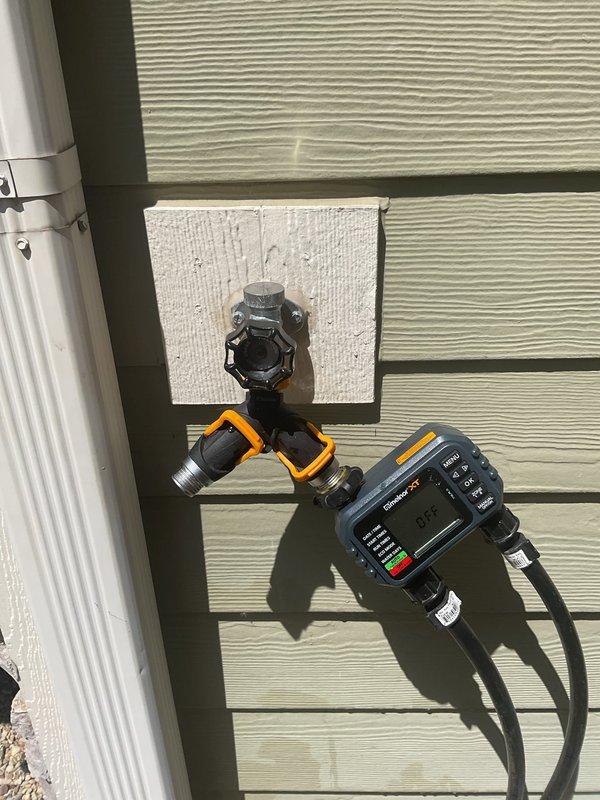 Replaced defective vacuum breaker on exterior hose spigot. Removed old unit and installed new vacuum breaker assembly to prevent backflow contamination of potable water supply. All work completed from exterior of property, ensuring proper sealing and functionality of outdoor water connection.