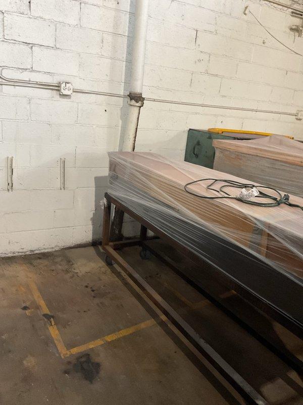 Responded to a non-service call requiring managerial review. Site inspection conducted and photographic documentation completed of basement utility area showing plumbing infrastructure, fire safety equipment, and workspace configuration. No drain or sewer service work performed at this time pending further assessment and approval.