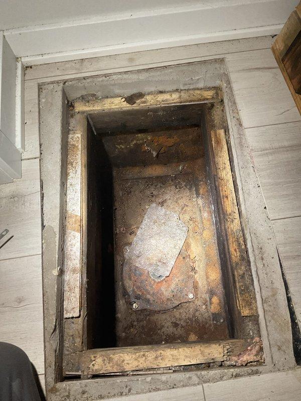 Performed main sewer line rodding service and conducted inspection of basement plumbing system. Identified corroded galvanized piping at transition point where previous copper pipe installation connects to existing galvanized line, requiring replacement to prevent future leaks and maintain system integrity. Documented conditions via photography including crawl space access point and overhead pipe configuration showing corrosion at joint connections.