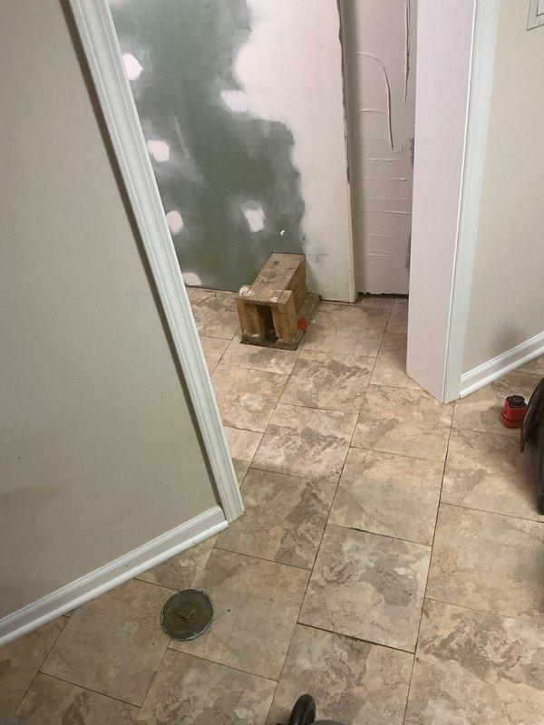 Responded to priority morning callback request as first appointment of the day. Conducted on-site assessment and provided estimate for installation of flood control system. Documented existing conditions of entry area with marble tile flooring where system would be integrated. Evaluated property layout and access points to determine optimal flood prevention solution for residential application.