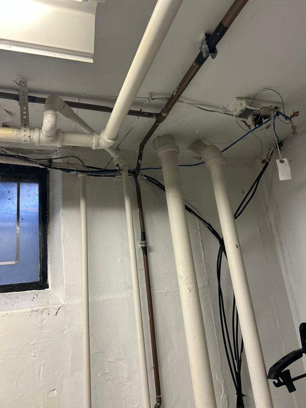 Successfully removed the existing hose bib and installed a new PRIER quarter-turn frost-free valve with green handle. The water supply was shut off during the repair, and the new valve was properly soldered onto the copper pipe connection to ensure a leak-free seal.