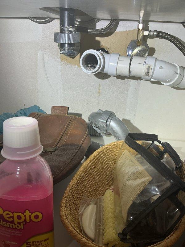 Replaced defective shut-off valves beneath bathroom vanity and successfully installed new double vanity unit with white cabinet, integrated undermount sink, and brushed nickel faucet fixtures. All water supply lines and drain assembly were properly connected, tested for leaks, and confirmed operational upon completion.