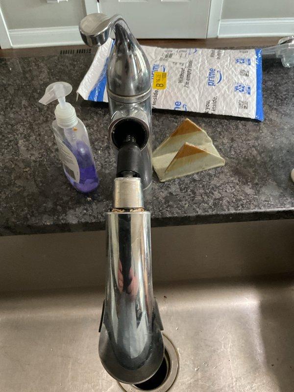 Completed kitchen faucet installation, replacing existing fixture with new chrome-plated single-handle unit. Removed old faucet assembly, prepared mounting surface, and installed new fixture with proper supply line connections and tested for leaks to ensure proper operation.