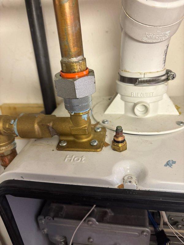 Completed comprehensive plumbing maintenance inspection of residential property with no active issues reported. Performed thorough evaluation of water heater connections, including hot water outlet piping, brass valves, pressure relief components, and PVC discharge lines, confirming all connections secure with proper sealing and no visible leaks. Inspected copper supply lines, compression fittings, and shut-off valves throughout the system, noting age-appropriate patina on copper piping with no signs of corrosion or deterioration. Examined condensate neutralizer assemblies with mounting hardware and drain valves, verifying proper installation and functionality. All plumbing fixtures, connections, and components found to be in good working condition with no immediate maintenance concerns identified.