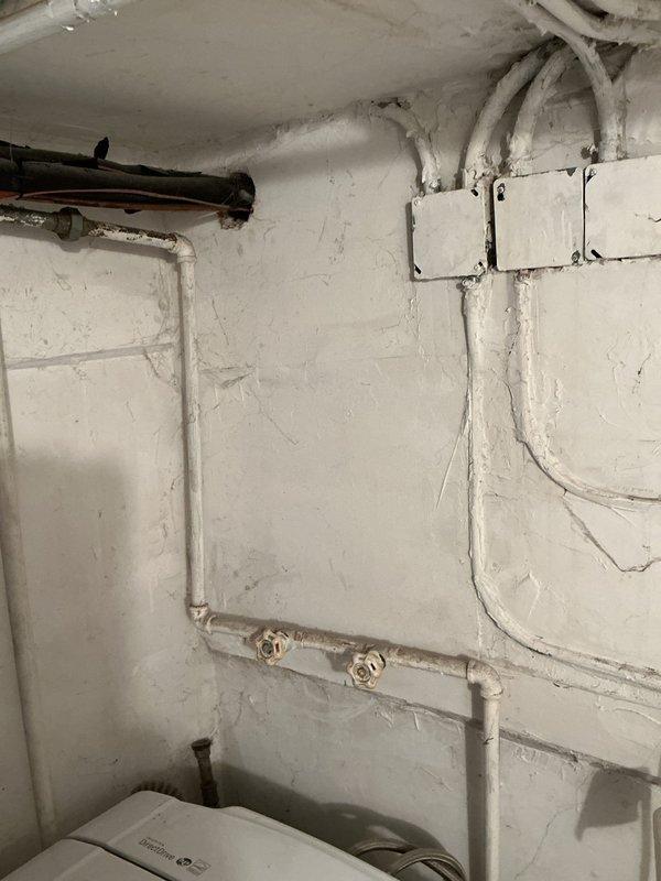 Installed new outdoor spigot/shower system with supply lines routed through basement utility area. Copper piping with brass shut-off valves installed and secured along wall joists, with all connections properly soldered and tested for leaks to ensure reliable water delivery to exterior fixture.