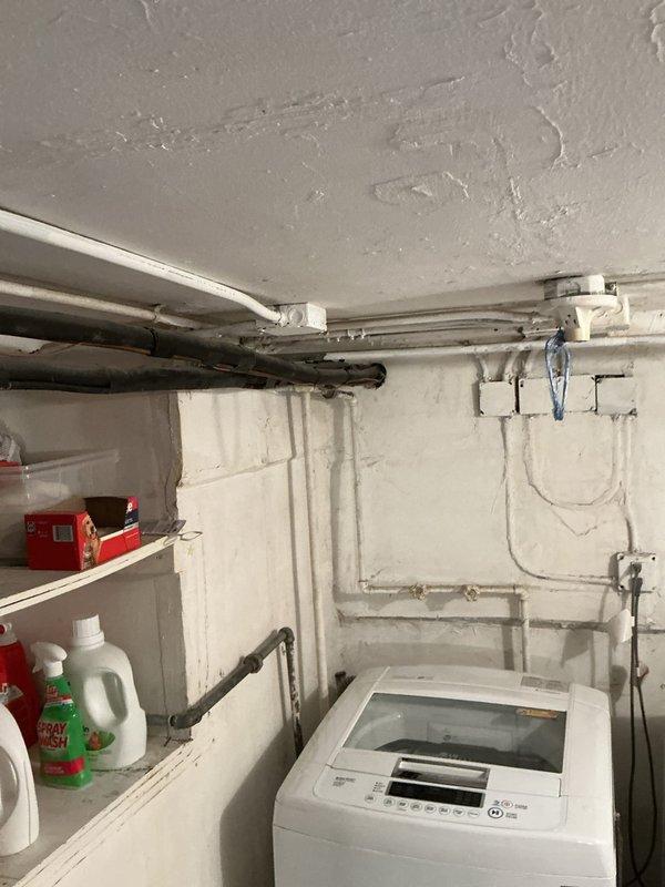 Installed new outdoor spigot/shower system with supply lines routed through basement utility area. Copper piping with brass shut-off valves installed and secured along wall joists, with all connections properly soldered and tested for leaks to ensure reliable water delivery to exterior fixture.