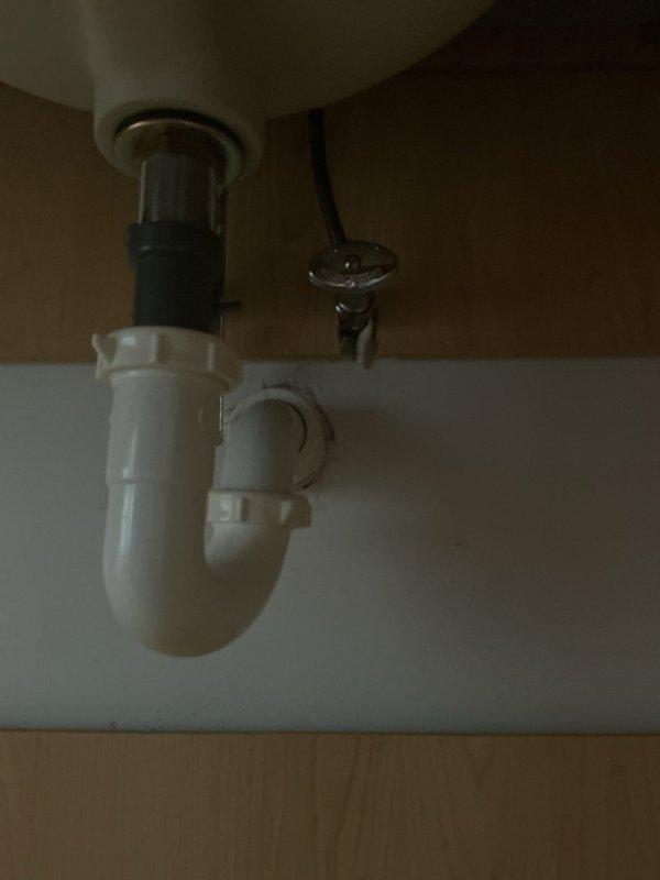 Removed two bathroom faucets as requested, disconnecting supply lines and drain assemblies from beneath the fixtures. Inspected existing plumbing connections including P-trap assemblies, shut-off valves, and supply line configurations to ensure proper disconnection without damage to remaining plumbing infrastructure.