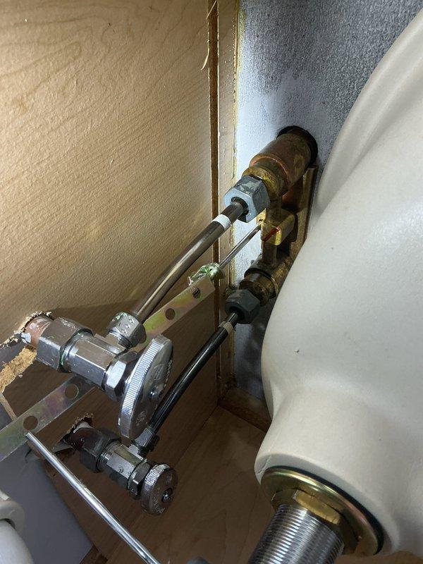 Removed two bathroom faucets as requested, disconnecting supply lines and drain assemblies from beneath the fixtures. Inspected existing plumbing connections including P-trap assemblies, shut-off valves, and supply line configurations to ensure proper disconnection without damage to remaining plumbing infrastructure.