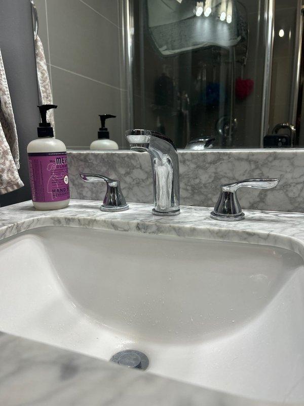 Responded to service call addressing multiple plumbing issues including clogged sink drain, several leaking faucets throughout the property, and low water pressure at outdoor spigot. Successfully cleared drain obstruction using appropriate drain cleaning equipment and restored proper drainage flow. Repaired leaking faucets by replacing worn washers, cartridges, and O-rings as needed. Diagnosed and resolved low water pressure issue at exterior spigot by inspecting supply line, clearing mineral buildup from aerator, and ensuring proper valve operation. All fixtures tested and verified to be functioning properly upon completion with no active leaks and restored water pressure.