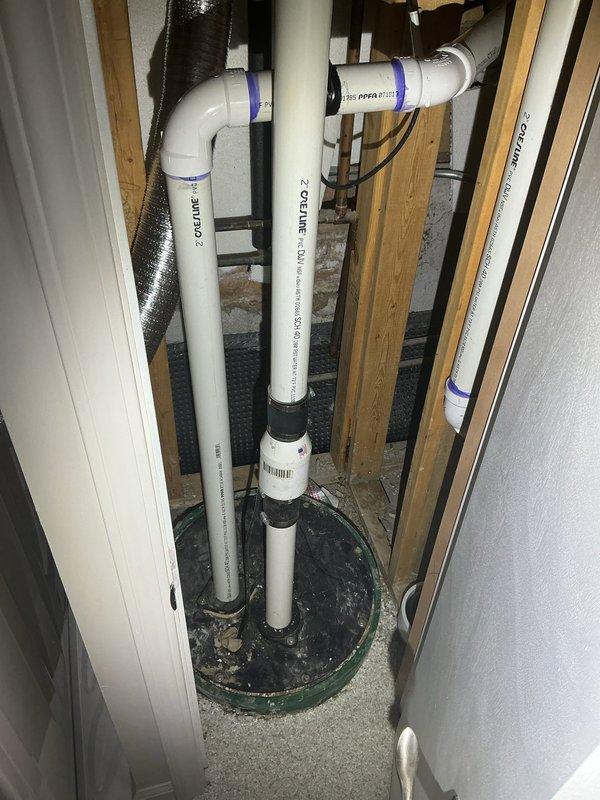 Responded to recurring ejector pump check valve failure. Inspected existing PVC discharge piping system and identified failed check valve causing backflow issues. Replaced defective check valve with new Schedule 40 PVC check valve assembly. Installed rubber couplings to facilitate future maintenance access. Properly primed and cemented all PVC connections per code requirements. Tested system operation to verify proper flow direction and confirm check valve seating correctly to prevent backflow into ejector pit.