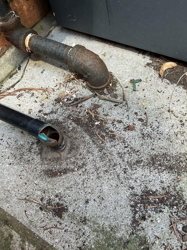 Responded to priority call for leaking outdoor spigot at 110-year-old residence. Upon inspection, found severely corroded elbow fitting on exterior hose bib with active water seepage due to age-related deterioration of original piping. Removed failed brass elbow and deteriorated sections of oxidized piping. Installed new brass compression fittings and copper pipe sections to restore proper water flow and eliminate leak. Secured all pipe runs to brick exterior wall with appropriate mounting brackets. Tested system under full pressure to verify leak elimination and proper operation of shutoff valve. All connections sealed and functioning properly upon completion.
